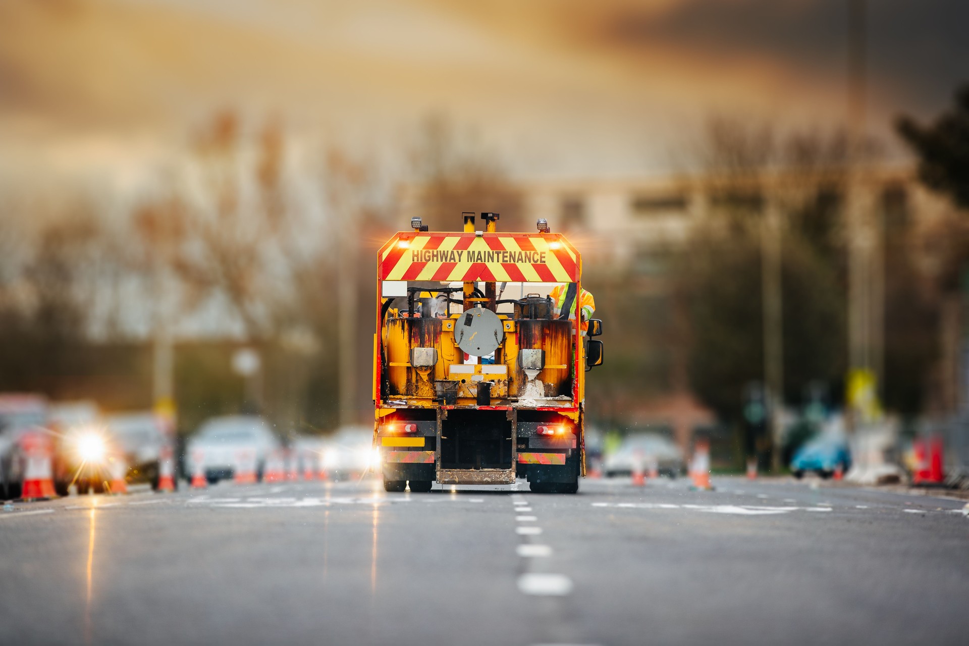 London street roadworks scene with Highway Maintenance car